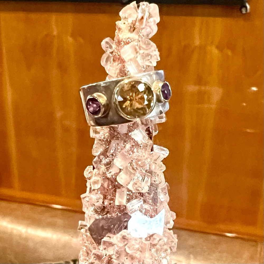 Citrine and amethyst set in 14 Karat Gold on Sterling Silver Band